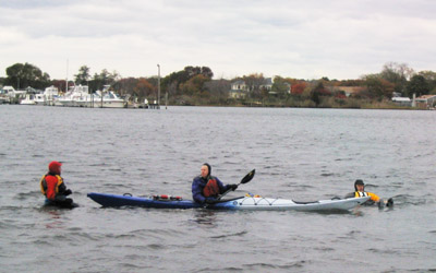 L4 Students dressed for winter paddling practice rescues