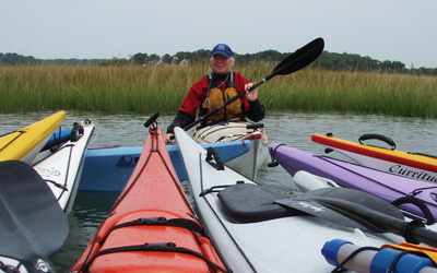 Elizabeth preparing a group of rafted students for a lesson